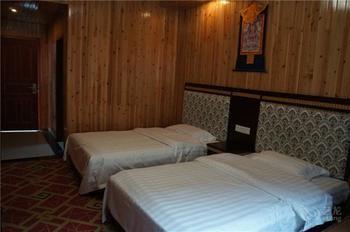 Xunji Hotel Цзючжайгоу Экстерьер фото